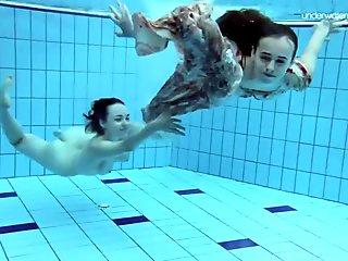 Two hot hairy beauties underwater